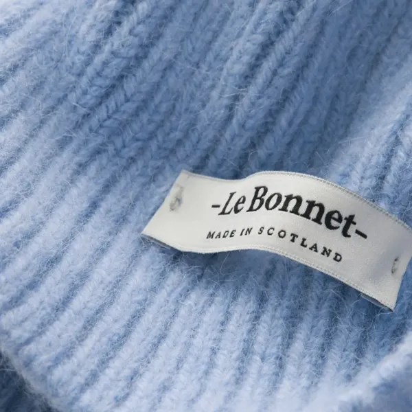 bonnet_en_laine_caregora__SKUd799e8e82a1b41c0a39b488ee96ec25d_1.webp Bonnet En Laine Caregora - Bleu Clair-Le Bonnet